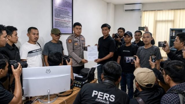 Laporan AJB diterima secara resmi oleh Polres Bolmut (foto asli di compres dalam AI)